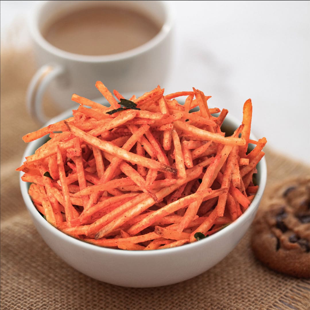 Crunchy South Indian Kappa Kolli chips with lays cut from Southside Habits placed in a bowl